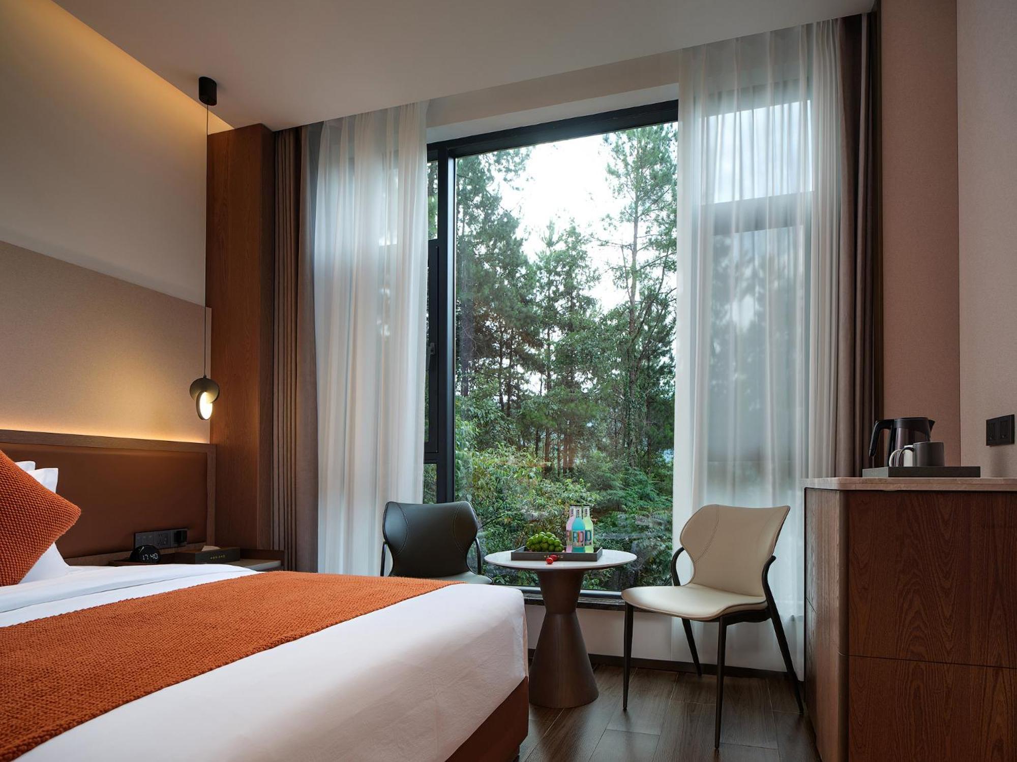 Zhangjiajie Utopia Hotel--Free One Way Pick Up Service Over 2 Nights מראה חיצוני תמונה